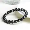 Pulsera de Bola Redonda Cristal Natural Jiuyacristal Grado 7A Fantasma Negro Pulsera de Bola Suelta Tazón del Tesoro Negro Wholesale