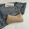 Bolso de axila tejido tipo baguette de verano para mujer 2026 nuevo moda elegante bolso de hombro versátil bolsa de paja ins moderna