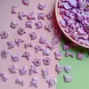 Bolsa de biblioteca morada brillante Serie diy carcasa de teléfono móvil de crema paquete de materiales para horquilla diadema de resina hechos a mano