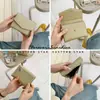 Cierre de cremallera ~ nueva cartera corta plegable para mujer al por mayor de alta gama diseño de nicho cartera de tela de moda