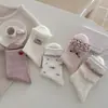 Meias rosa fofas femininas de cano médio estilo menina sem costura de algodão coração de desenho animado personalidade de vídeo meias longas para primavera e outono