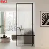 Pantalla de hierro forjado de lujo ligero, mampara de acero inoxidable y vidrio, recibidor, sala de estar, tocador minimalista moderno de celebridad de internet no