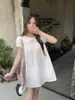 Camisa branca de gola Peter Pan de manga curta para mulheres, estilo japonês, doce, solta, modeladora, com mangas bufantes, top liso, novo modelo primavera/verão