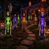 Luces de cadena de Halloween transfronterizas, luces de suelo de calavera, luces decorativas de ambiente para patio exterior y césped alimentadas por energía solar, esqueleto simulado
