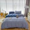 Oferta especial estilo luxo leve transmissão ao vivo conjunto de quatro peças cor sólida sono nu nórdico simples escovado amigo da pele fábrica de Nantong roupa de cama