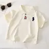 Camiseta de Manga Corta para Niños Verano Nuevo Estilo 2026 Ropa de Verano para Bebé Tops Clase A Camisas Polo Elegantes Ropa para Niños Venta al por Mayor
