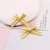 Nuevo estilo borde dorado cinta acanalada moño pequeño DIY ropa muñeca caja de regalo decoración zapatos y sombreros accesorios a juego