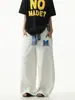 Pantalones de Chándal Unisex con Diseño de Estructura en el Dobladillo a Cuadros Patchwork Estilo Retro Americano Perezoso de Largo Completo Pantalones Paracaídas Modernos
