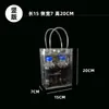 Fábrica de bolsos de mano transparentes de PVC suministro directo regalo regalo regalo regalo empaque para té de leche bolsa de mano de plástico impermeable
