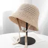 Sombrero de pescador de punto calado minimalista coreano para mujer, estilo casual con cordones, hace que la cara se vea más pequeña, tiene un aspecto de alta gama, adecuado para vacaciones