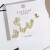 Pendientes Geométricos de Múltiples Piezas Inspirados en el Diseño para Mujer, Moda Versátil de Lujo Ligero de Nicho, Accesorios Electrochapados Ecológicos de Yiwu al por Mayor