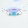 Pulsera de Hilo de Colores con Cuentas de Vidrio y Flor de Narciso Seca Estilo Coreano Fresca y Sencilla, Flor Eterna Regalo de Pareja para Mujeres, Accesorio para la Mano
