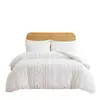 Juego de funda de edredón y fundas de almohada de tres piezas de color sólido bohemio con recortes y borlas, juego de ropa de cama simple para comercio exterior transfronterizo