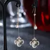 Brincos Exclusivos de Girassol Vazado em Estoque Transfronteiriço, Joias de Pérola para Mulheres, Brincos Metálicos Minimalistas Elegantes de Nicho com Diamantes