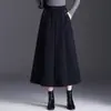Falda de Cintura Elástica Estilo A para Mujer Otoño/Invierno 2026 Nueva de Cintura Alta Adelgazante de Longitud Media Elegante Versátil con Dobladillo Ancho
