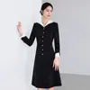 Vestido de costura en blanco y negro Ai Shangchen para mujer 2025 Primavera Nuevo Sentido de Alta Gama Elegante Elegante Ropa de Trabajo Falda OL
