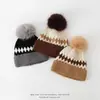 Gorro de punto jacquard estilo americano transfronterizo, gorro de pompón protector para orejas estilo coreano para niños mayores, gorro de lana cálido para niños de comercio exterior