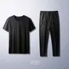 Traje deportivo para hombre, verano, seda de hielo, malla, pantalones casuales, talla grande, pantalones de aire acondicionado, secado rápido, camiseta de manga corta moderna para hombre
