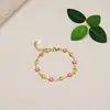 Moda Floral Nuevo Goteo de Aceite Pulsera de Oro de 18K Temperamento Simple Versátil Margarita Mezcla Joyería de Acero de Titanio