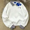 Moletom Spliced Gola Polo Falso Duas Peças Estilo College Estilo Coreano para Mulheres Outono e Inverno 2025 Versátil Casual Redutor de Idade Top