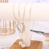 Cadena de suéter de perlas directa de fábrica para mujer, nuevas decoraciones para ropa, pequeños accesorios colgantes, collar largo simple y versátil