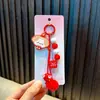 Llavero de Cabina Navideña con Cuentas para Teléfono, Colgante con Pompón para Llaves de Coche, Colgante para Bolso de Mujer, Regalo Pequeño al por Mayor