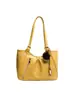 Elegante bolsa de ombro feminina 2026 novo modelo, bolsa tote de grande capacidade para o dia a dia, bolsa de mão versátil e da moda, bolsa simples de ombro