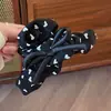 Nuevo Clip de Lazo Negro Estilo Coreano Moda Corazón Puntos Pinza Tiburón Pequeño Aroma Chica Cola de Caballo Clip Superior Tocado