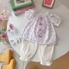 Conjunto de Ropa de Verano para Niñas 2025 Nuevo Elegante de Moda para Bebés y Niños Pequeños Conjunto de Dos Piezas de Manga Corta con Lazo Venta al por Mayor