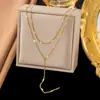 [Collar Explosiones 2] Collar simple de nicho de personalidad de gran venta con colgante de diseño con sentido de estrella de mar con textura de puntos de onda para mujer