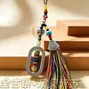 Joia de liga metálica estilo étnico chinês, pingente decorativo de vajra oval giratório, lembrança de viagem atacado