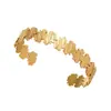 Europa y Estados Unidos Nuevo Color Oro de 18k Acero Inoxidable Pulsera Pulsera para Mujer Alto Sentido Flor Hoja Apertura Pulsera de Titanio