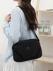 Bolso pequeño ligero de nailon para mujer, estilo nuevo 2026, versátil para el uso diario, bolso cruzado impermeable