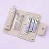 Cortador de Unhas Angulado Estilo Alemão Transfronteiriço Conjunto de Ferramentas de Manicure 10 Peças Lixa de Unha Dobrável Portátil de Alta Qualidade e Conjunto de Cortadores de Unha