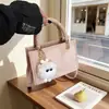 Bolsos pequeños transfronterizos 2026 verano nuevos bolsos de mano, modernos y a la moda, diseño de nicho coreano, bolsos cruzados para mujer