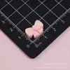Acessórios de resina com laço tridimensional emendado em duas cores para acessórios de cabelo, tiaras, chaveiros feitos à mão DIY, materiais de cola creme atacado