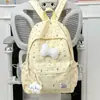 Mochila fresca y sencilla de lunares con lazo para mujer, nuevo modelo 2026, mochila versátil de gran capacidad para estudiantes de secundaria y preparatoria