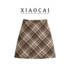 Saia lápis de lã para outono e inverno, saia curta versátil vintage nova para mulheres, saia xadrez de cintura alta em linha A para afinar, para mulheres baixinhas