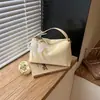 Bolso de Lunares Único y No Masificado para Mujer 2026 Modelo Nuevo Exquisito Bolso Tote Pequeño Versátil Bolso de Hombro Cruzado