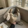 Bolsa pequeña popular con estampado de lichi para mujer, nueva bandolera de cubo de moda con textura para el trabajo 2026