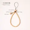Lembrete Bodhi Leão texto Lanyard para celular Sementes de maracujá Pequeno King Kong com Caroço de azeitona Seção de bambu Saco da sorte Pingente Lanyard de pulso