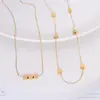 Gargantilla de personalidad europea y americana, diseño de nicho ligero de lujo, cadena plana en forma de S, acero de titanio, oro de 18 quilates, collar de clavícula con pequeño grano de oro