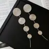 Pendientes de Borla con Textura Metálica Redonda Aguja de Plata Pendientes Exagerados Elegantes de Estilo Transfronterizo Europeo y Americano Lujo Accesible Versátil