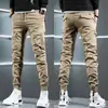 Pantalones casuales de primavera para hombre, estilo coreano, ajustados a la moda, pierna cónica, pantalones de trabajo modernos, pantalones largos multibolsillos, estilo deportivo