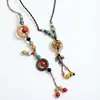 Collar de cuerda de cerámica estilo bohemio retro para mujer, nuevo estilo chino, estilo étnico, nicho, accesorios de estilo zen de alta gama.