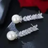 Ventas directas de fábrica de pendientes de moda europeos y americanos de circonita de grado A con baño de oro, pendientes de temperamento simple, pendientes con pasador de plata S925