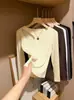 Versátil camiseta interior hueca para otoño e invierno, de cuello redondo para mujer, tejido de alta elasticidad, corte entallado que estiliza, diseño de hombro normal, color liso, manga larga