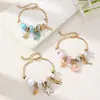 Pulsera de cuentas de resina con flores de dibujos animados de venta cruzada europea y americana, joyería de aleación con colgante de cuentas DIY Panjia al por mayor