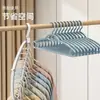 Perchero giratorio multifuncional, adecuado para dormitorios y uso doméstico, con características antideslizantes y plegado mágico, que cuenta con 11 orificios para organizar la ropa