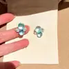 Brincos de Zircônia Redonda Transparente Blue Ice para Mulheres 2026 Novo Exclusivo de Alto Padrão Brincos de Tarraxa Joias de Orelha Únicas e Bonitas